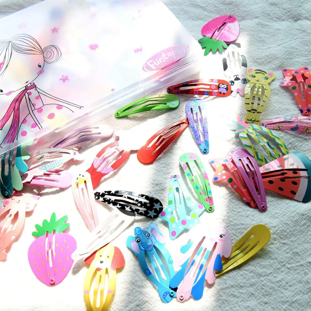 Assortment of 100 metal snap hair clips in candy colours including animal, fruit, crown and star shapes.