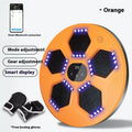Smart music-reactive boxing target hanging on a wall in a home gym setting.