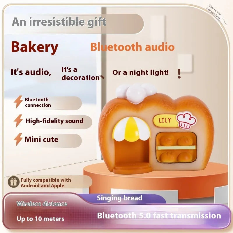 White ABS bakery Bluetooth speaker with glowing bread-shaped design, 155x90x115mm, FM/TF/USB/TWS modes
