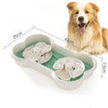 Large green dog slow feeder bowl with three-tier puzzle design and suction cup base for large breeds.