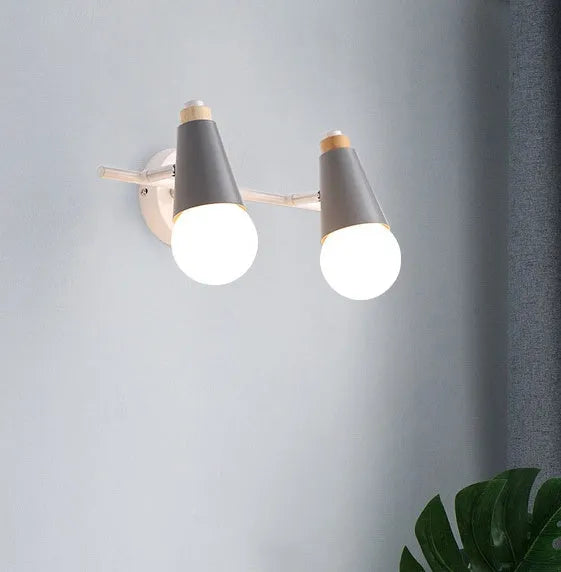 Modern minimalist Macaron iron LED wall lamp for bedroom in black or grey or white, 2 or 3 heads, 220V