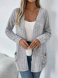 Plus size loose fit cardigan with long sleeves and pockets in black or granny grey colour