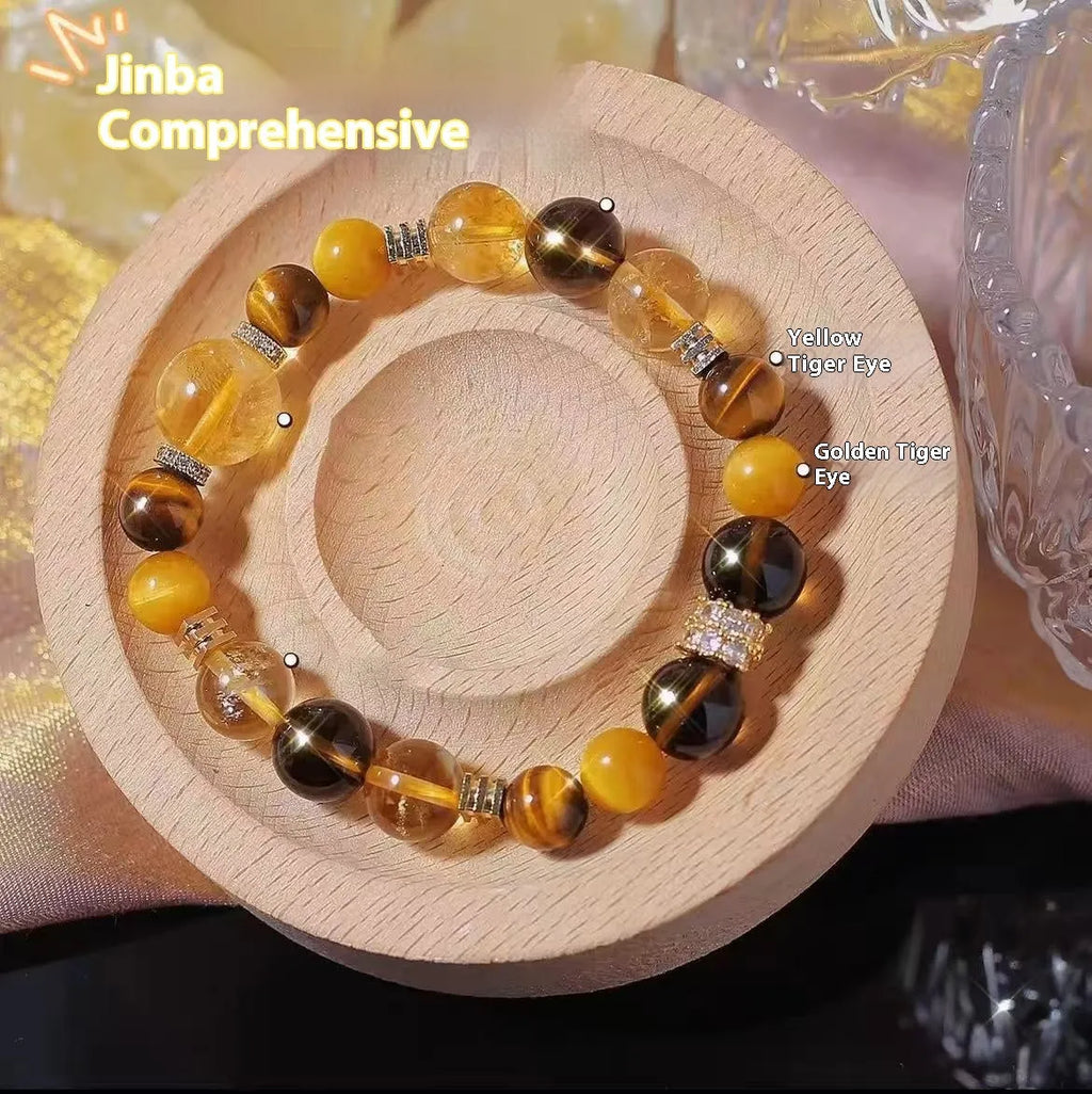 Yellow artificial crystal bracelet with 10mm Jinba large beads on a string.