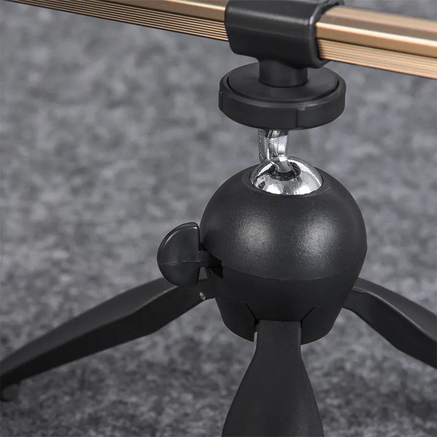 Aluminium ice fishing triangle rod holder bracket supporting a small fishing rod
