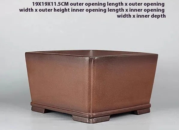 Brown handmade purple clay flower pot with antique style measuring 19cm diameter