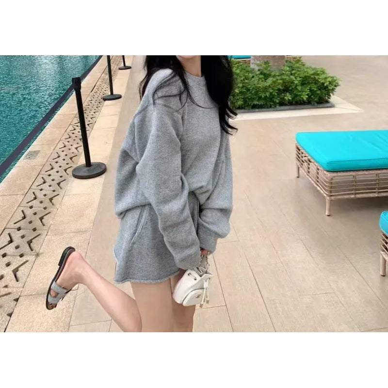 Women's loose-fitting long sleeve sweater and knitted wide leg shorts two-piece set in neutral colours