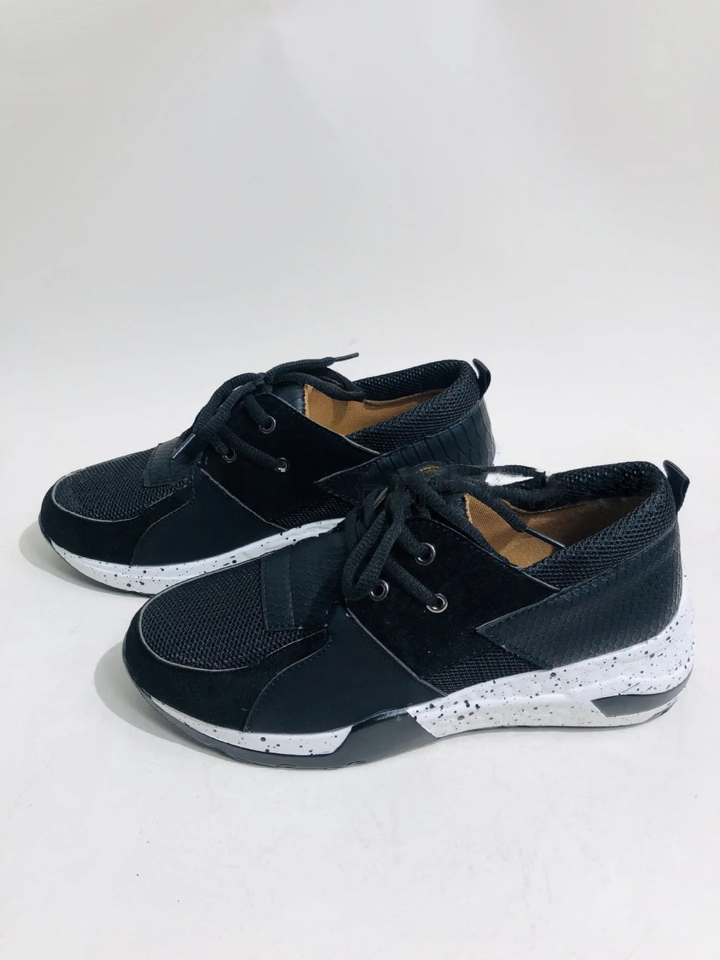 Women's suede flat sneakers with a wedge heel in black, leopard, pink, panther, and snake pattern colour options