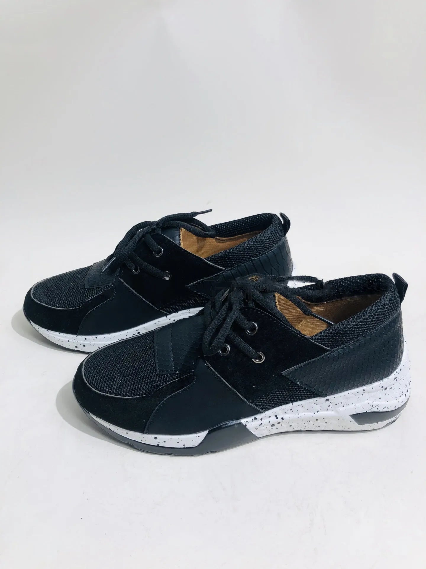 Women's suede flat sneakers with a wedge heel in black, leopard, pink, panther, and snake pattern colour options