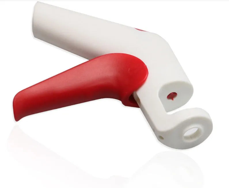 Manual cherry kernel remover kitchen tool with protective finger guard and stainless steel plunger