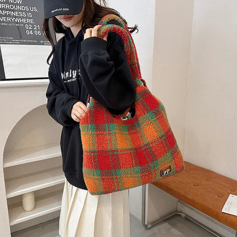 Women's plaid shoulder crossbody tote bag in soft plush material showing orange colour option