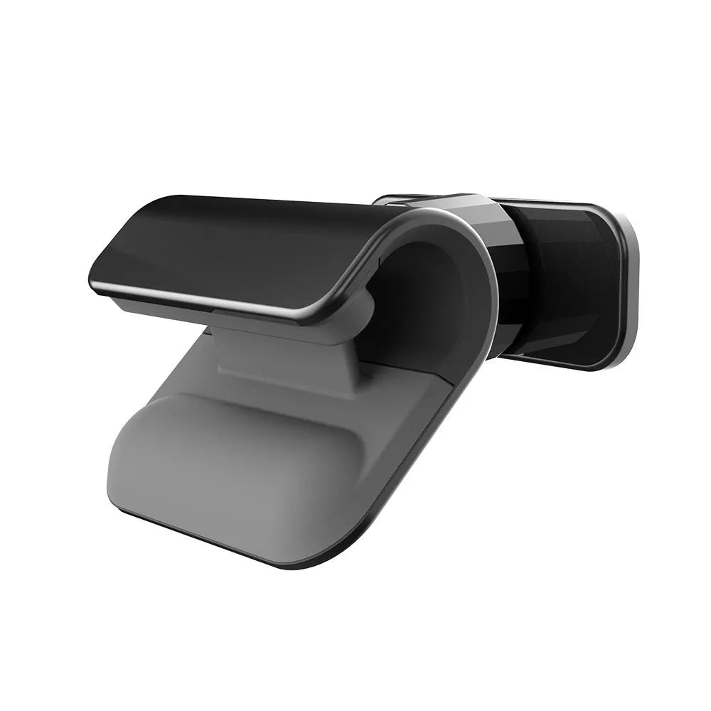 Black gravity car phone holder mounted on a car air vent, showing 360-degree rotation and universal phone grip.