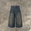 Men's black cropped denim shorts with flame embroidery patches, straight cut street style