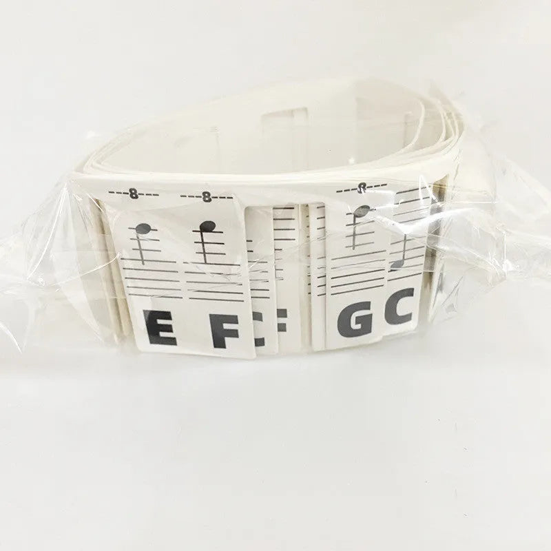 88 key piano note bar keyboard stickers on white card showing black and color note options for music learning