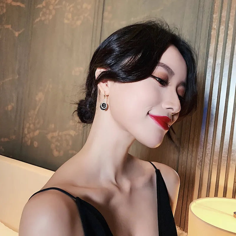 Black geometric circular alloy earrings with 3.6cm length and retro Hong Kong style design