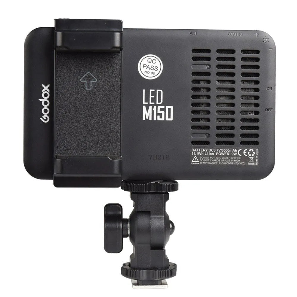 Shenniu M150 ultra-thin silver LED video light mounted on a mobile phone with bracket.