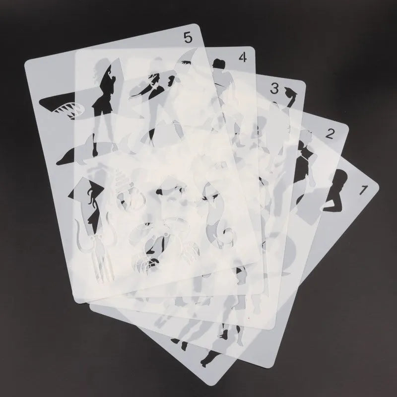 White plastic children's drawing stencil sets showing multiple template designs for tracing and artwork creation