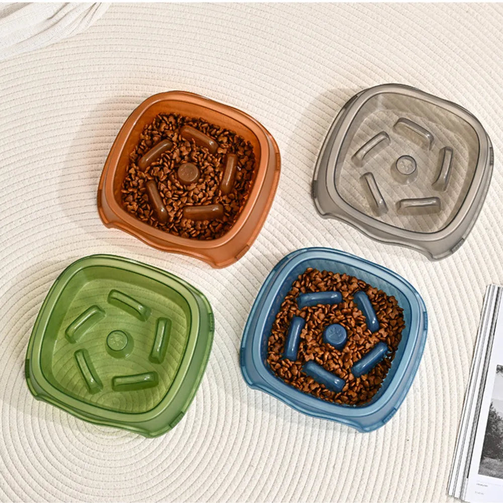 Blue plastic slow feeder dog bowl with raised obstacles for anti-choking design