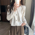 Women's long-sleeved acrylic cardigan coat in milky white colour, regular fit.