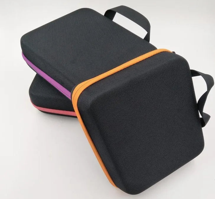 Red EVA cube essential oil storage bag with 30 compartments and a zip, shown next to bottles.