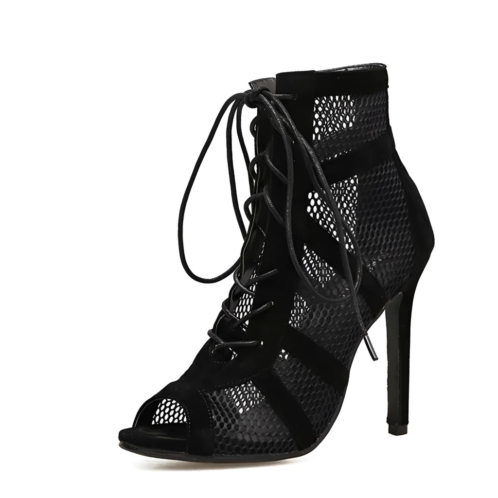 Black suede women's lace-up high heels with a high heel on a white background.