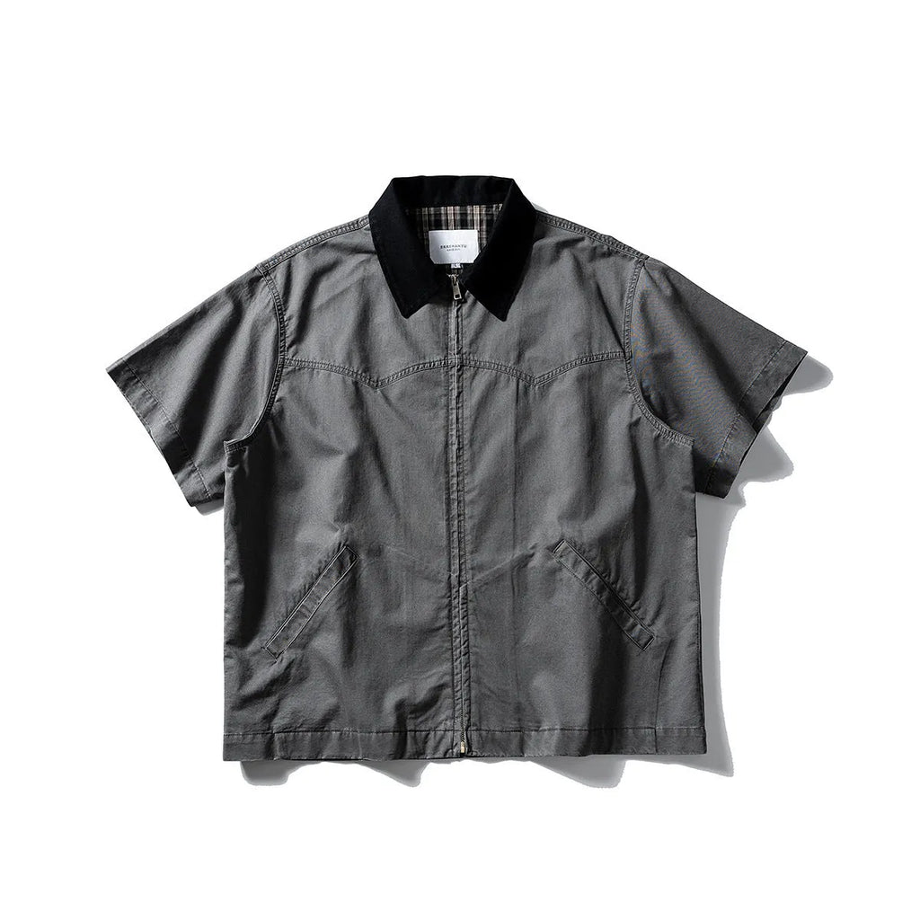 Man's loose-fitting khaki cotton overalls shirt with short sleeves, cardigan style