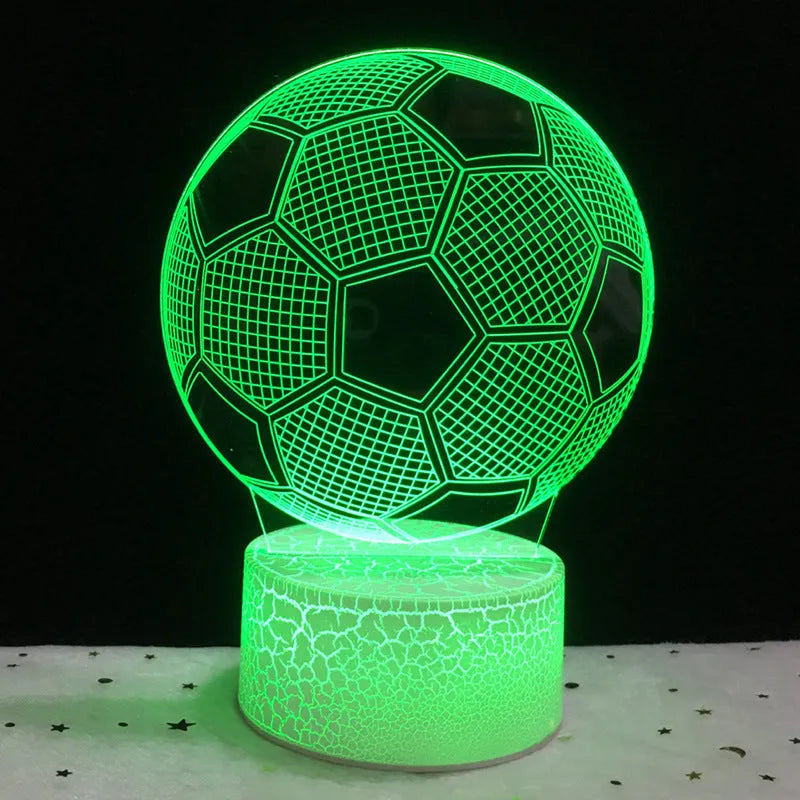 3D football shaped LED night light showing multiple colour options on a dark surface.
