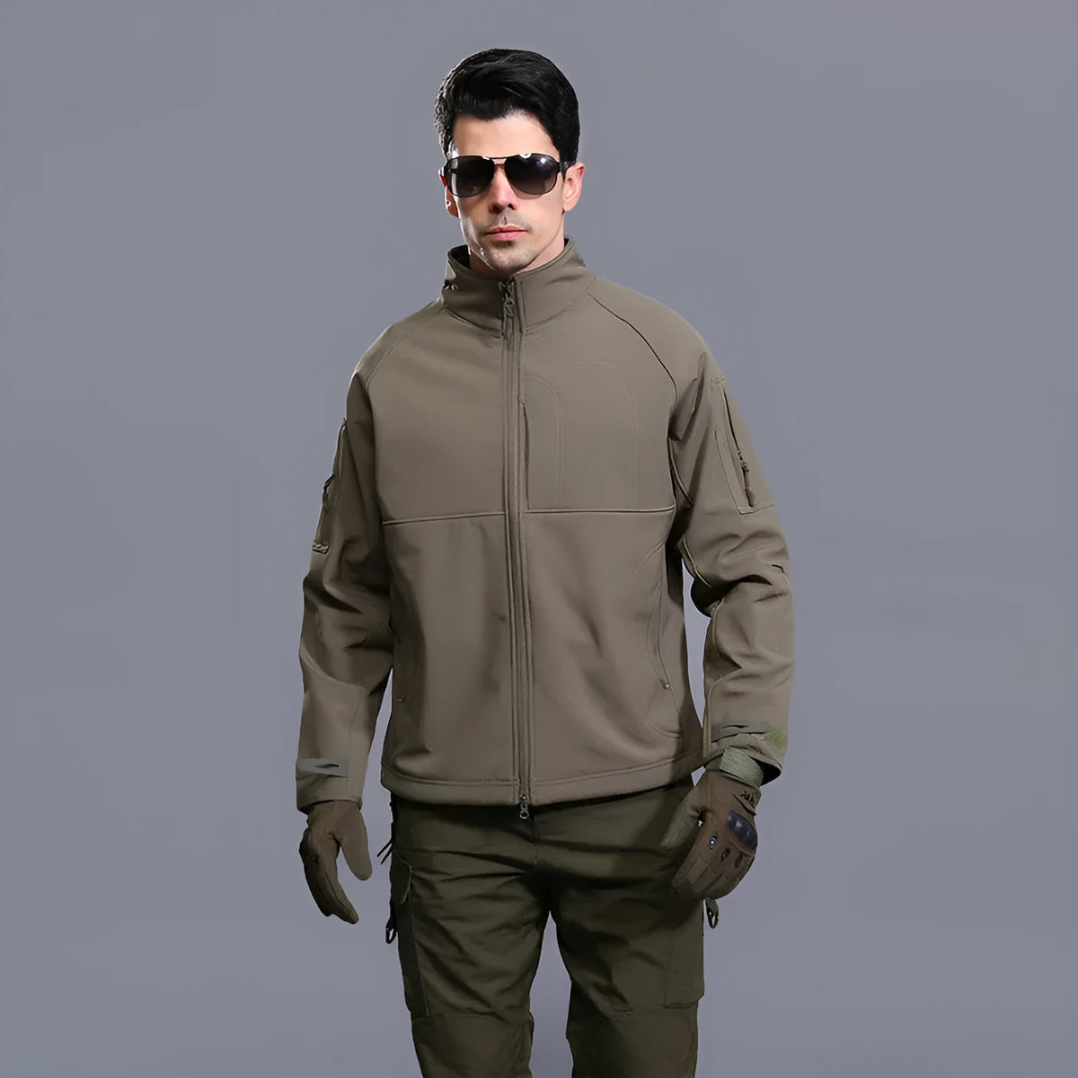 Man wearing a thin green commander stand collar outdoor jacket with a loose fit.