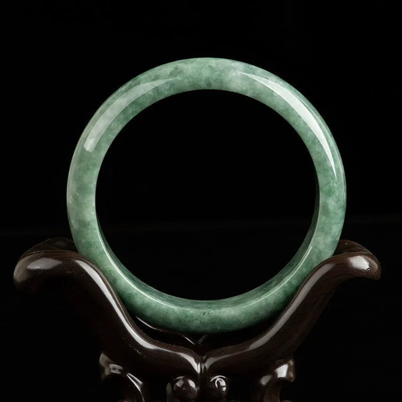 Natural emerald bean green beaded bracelet for women on a gift box.