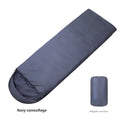 Navy blue envelope sleeping bag with polyester construction and hollow cotton fibre insulation for adult camping