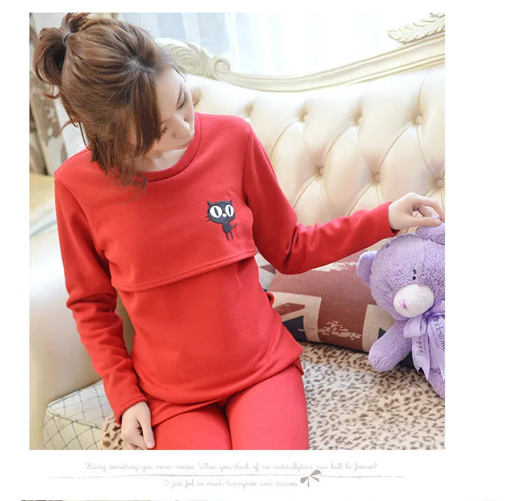 Maternity thermal underwear set in black, cotton long-sleeve top and long pants with cartoon pattern.