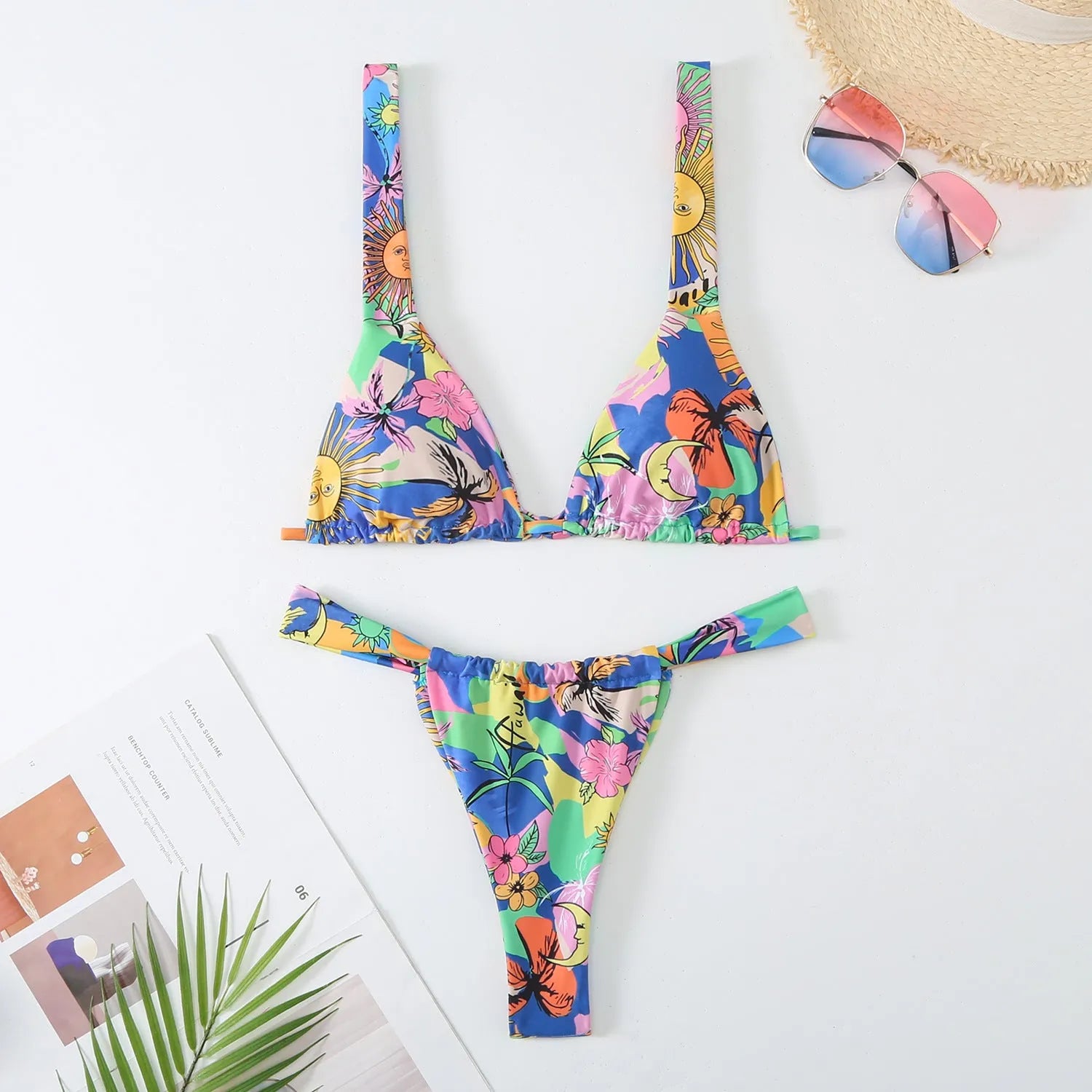 Women's floral print bikini swimsuit set in blue, rose red, sky blue, or white colours.