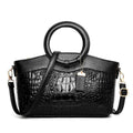 Ladies fashion handbag in multiple colours with zipper compartments measuring 31cm by 21cm by 13cm
