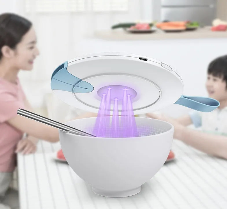 Blue portable UV baby bottle steriliser showing compact rectangular design with USB port