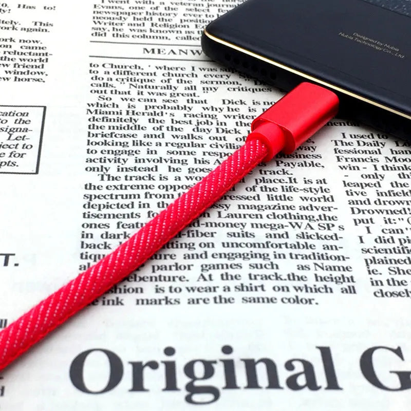 Denim braided USB-C charging cable with aluminium connectors shown in black, blue, and red colour options.