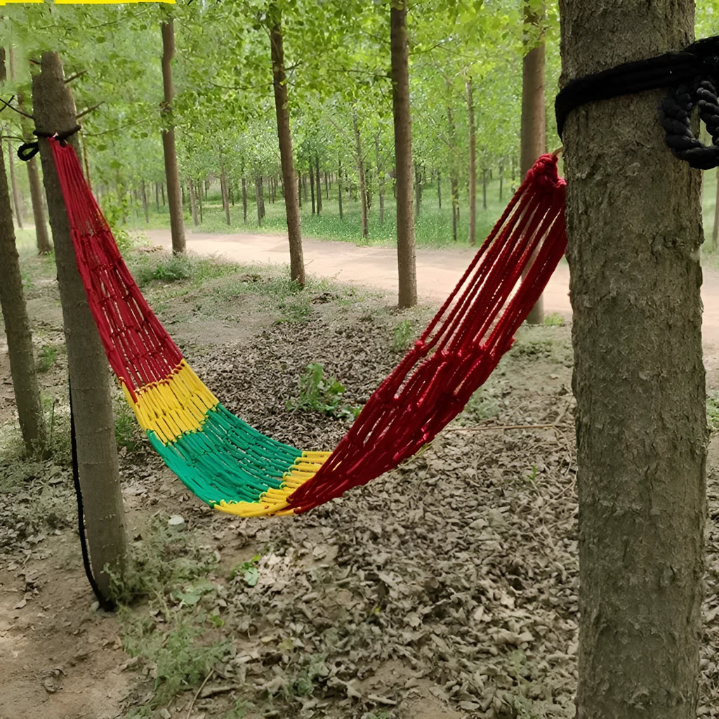 Outdoor nylon rope mesh hammock hung between two trees, showing its 1.1m width and included tying rope.