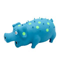 Pig-shaped latex dog chew toy with squeaker in various colours measuring 20x10cm