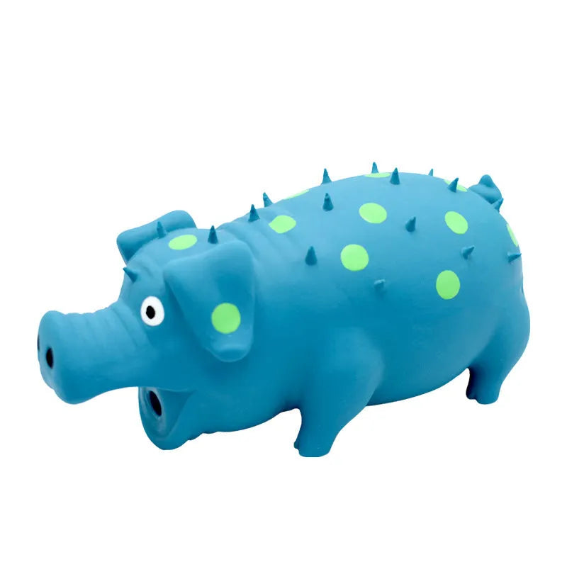 Pig-shaped latex dog chew toy with squeaker in various colours measuring 20x10cm