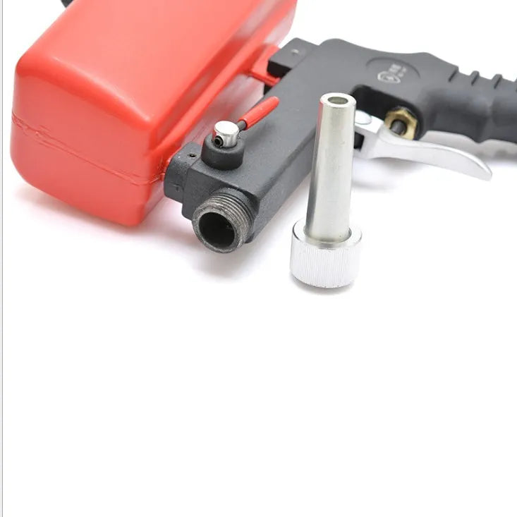 Portable black gravity-feed pneumatic sandblasting gun with 21lb tank.