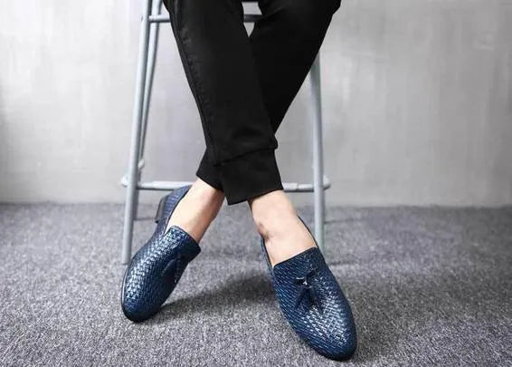 Anyaman men's woven loafers in black with soft sole, side view showing handcrafted weave texture