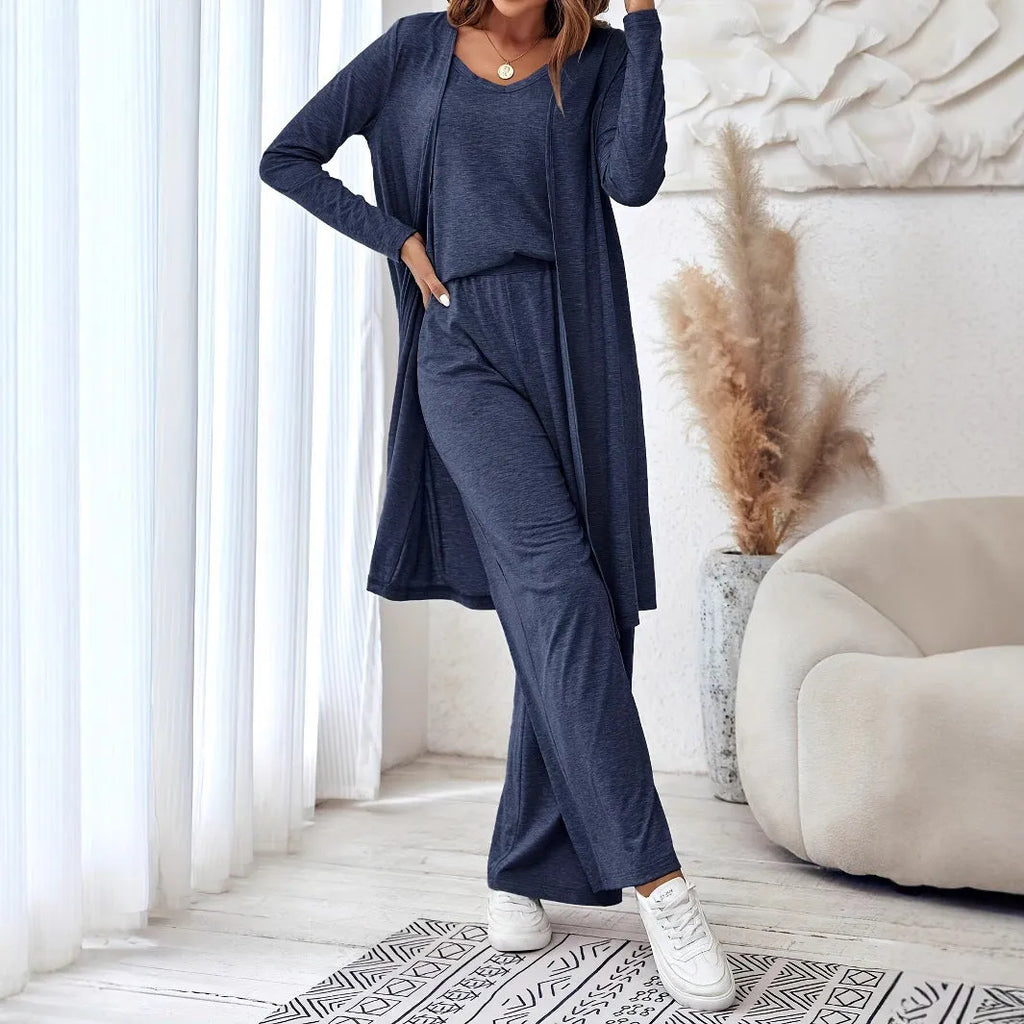 Blue women's casual co-ord suit with long sleeve cardigan and trousers on a hanger