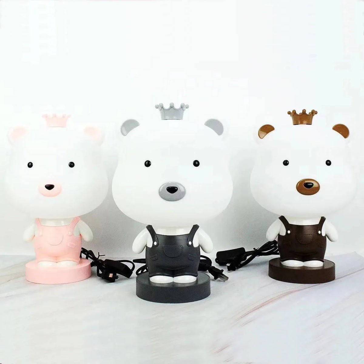 Cartoon-style animal table lamp with plastic shade in Bear, Cattle, Rabbit, or Tiger design.