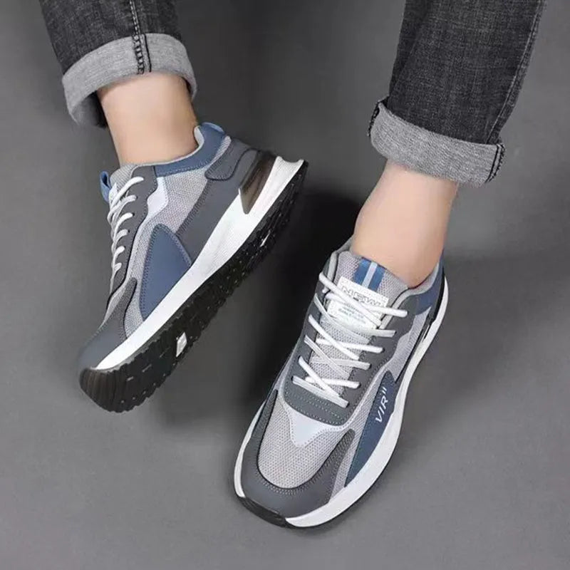 Men's colour block mesh running shoes in low-top design with lace-up front.