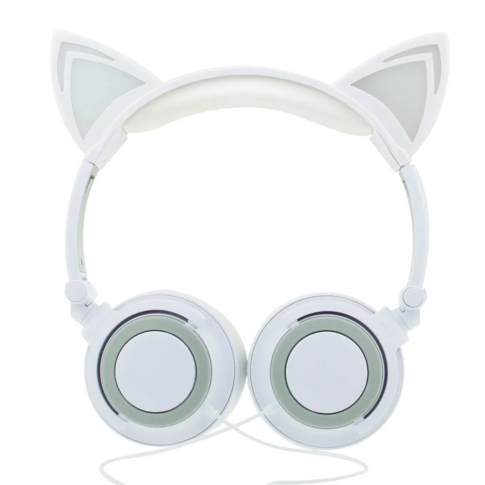 Black cat ear headphones with glowing pink LED lights on the ears and ear cushions.