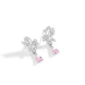 A pair of silver stud earrings featuring a butterfly design with crystal details on a white background.