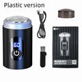 Black portable USB rechargeable electric shaver with LED display, shown with its cleaning brush and protective cover.