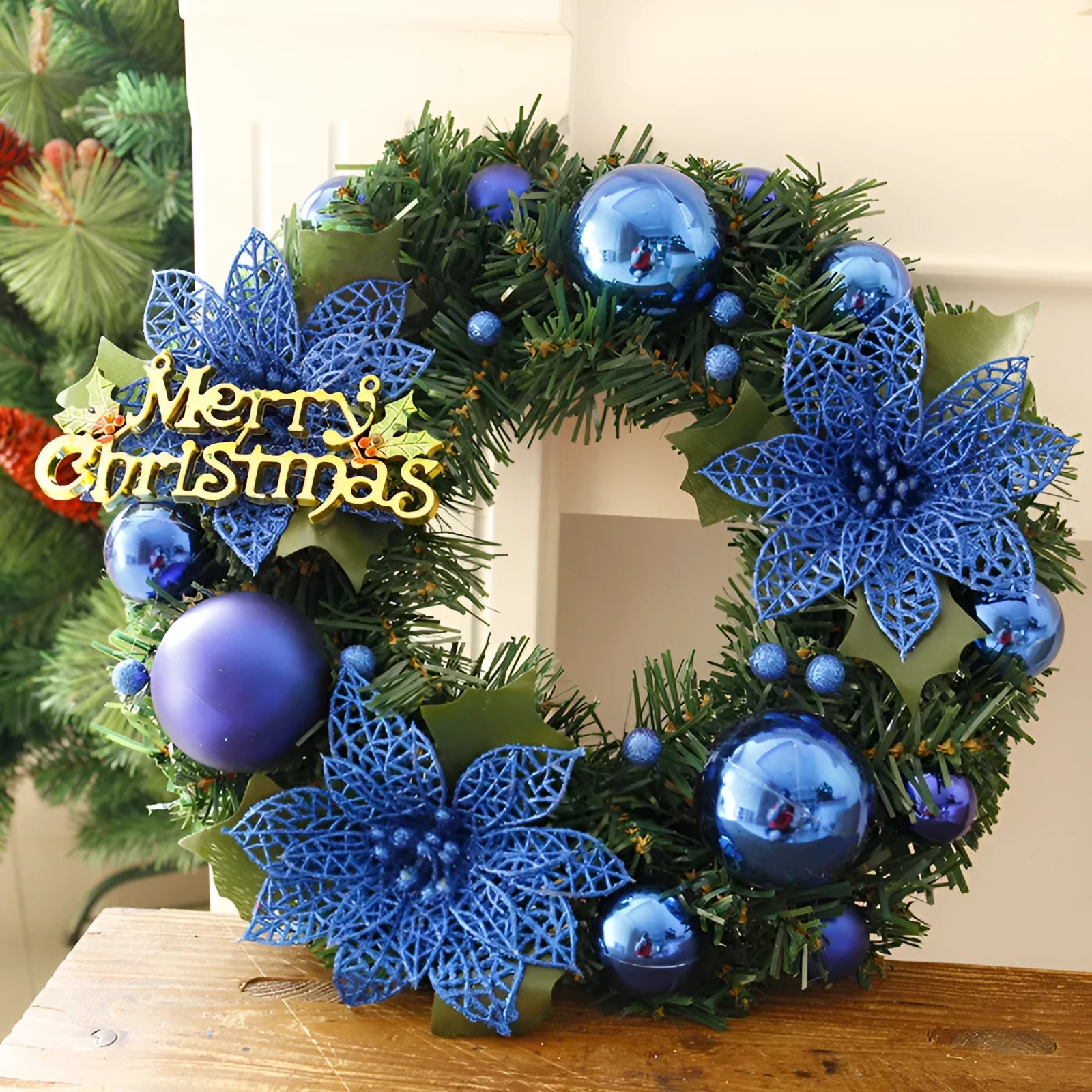 A multicolour plastic Christmas wreath with a 30cm diameter, shown in one of six colour options.
