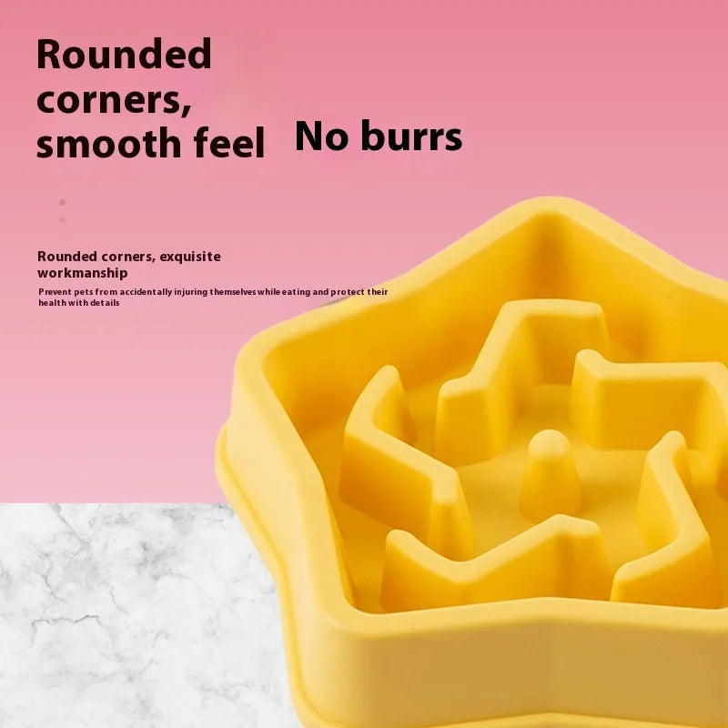 Yellow slow feeding dog bowl with rough plastic base design to prevent choking