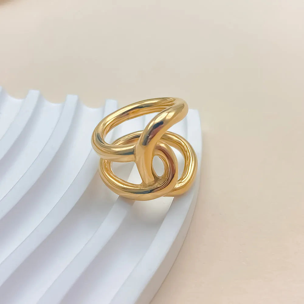 Adjustable stainless steel knotted ring in geometric U-shape design with opening closure