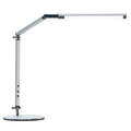 Clip-on aluminium desk lamp with remote control in dazzling black colour, mounted on a desk edge.