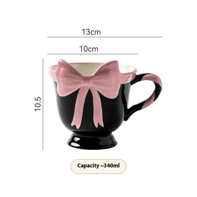 Ceramic heart bow mug with handle in white powder or black pink colour, 330ml capacity